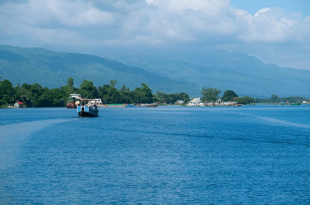 Travel to Sylhet from the USA and UK – scenic view of tea gardens, green hills, and rivers in Sylhet, Bangladesh